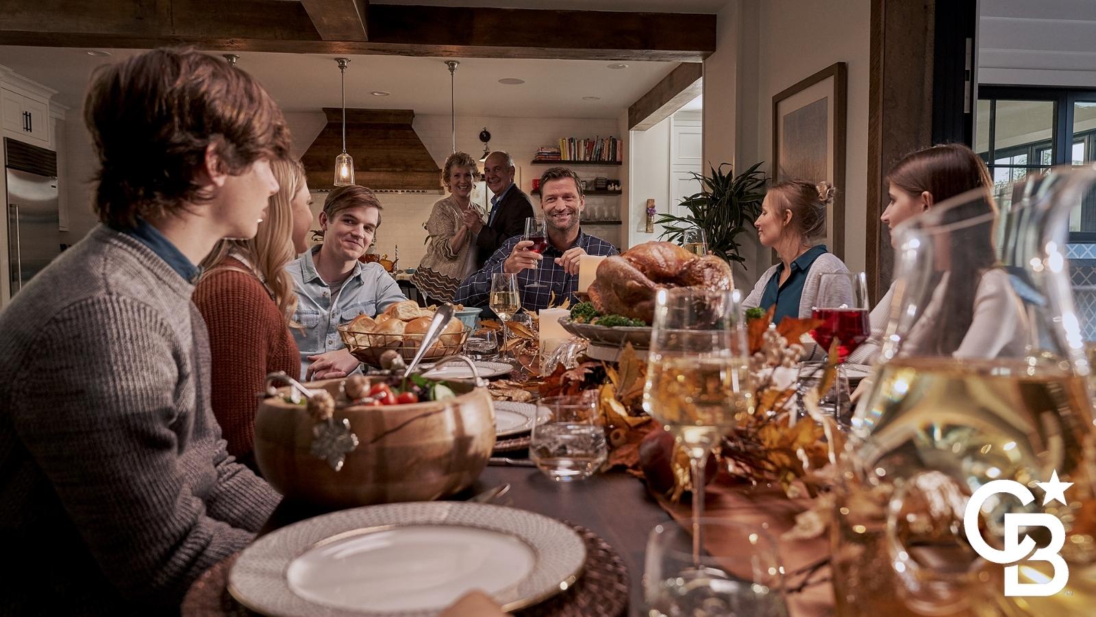 Family together at Thanksgiving dinner.